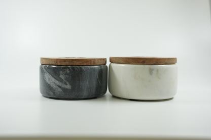 Side view black and white marble spice cellars with wooden lids by Casa de Abuela